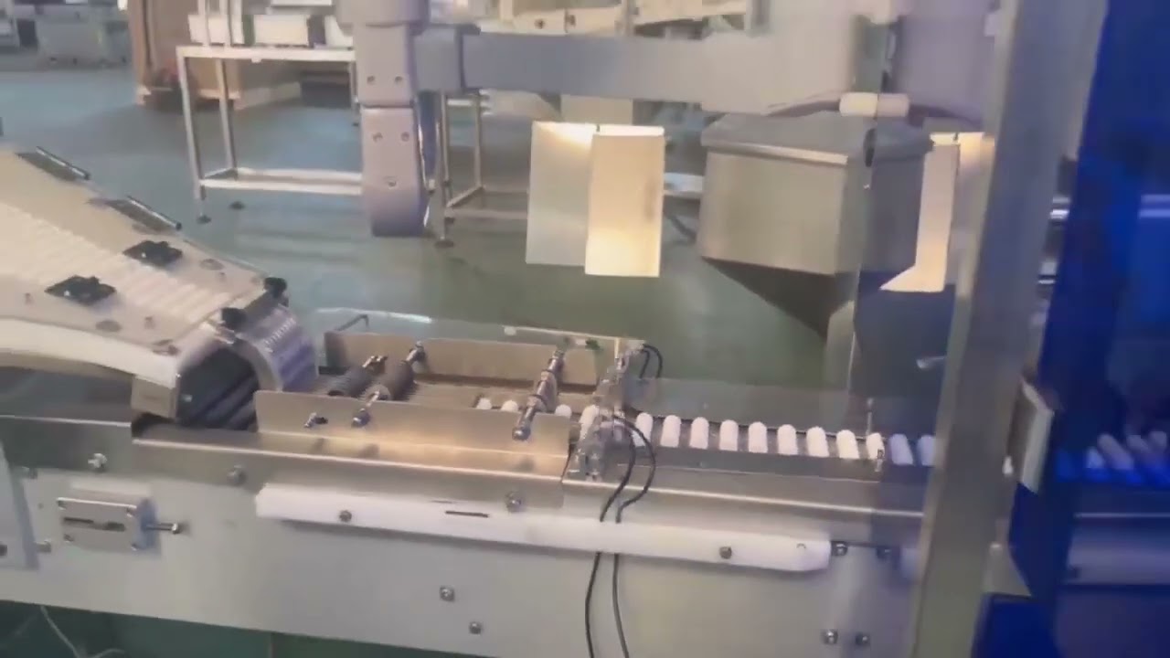 Effervescent tube packing machine with foil station