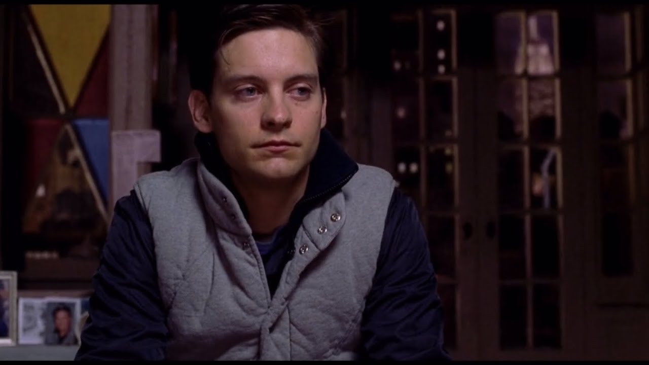 Peter Parker sitting in his apartment