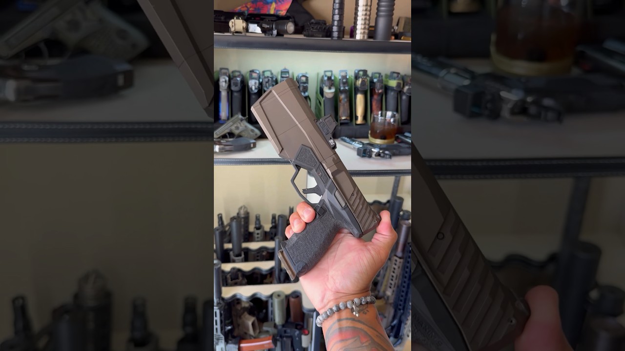 Robocop Gun!? #suppressor #silencer #suppressed #maxim9 #silencerco #capitolarmory #glock #bourbon