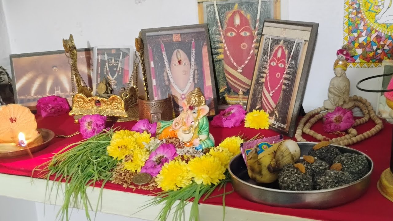 Why do we offer green moong and black sesame seeds to Devi 