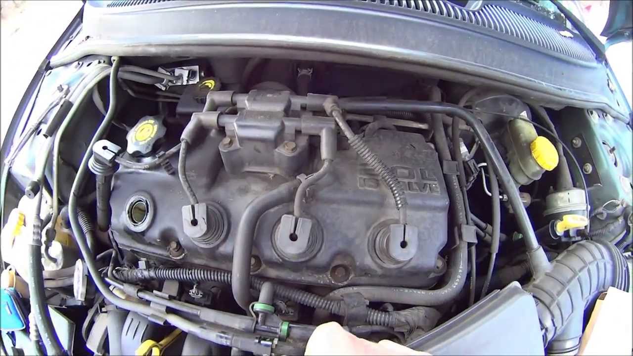 SPARK PLUG TUBE SEAL & VALVE COVER GASKET REPLACEMENT - 4 CYLINDER - 97 PLYMOUTH