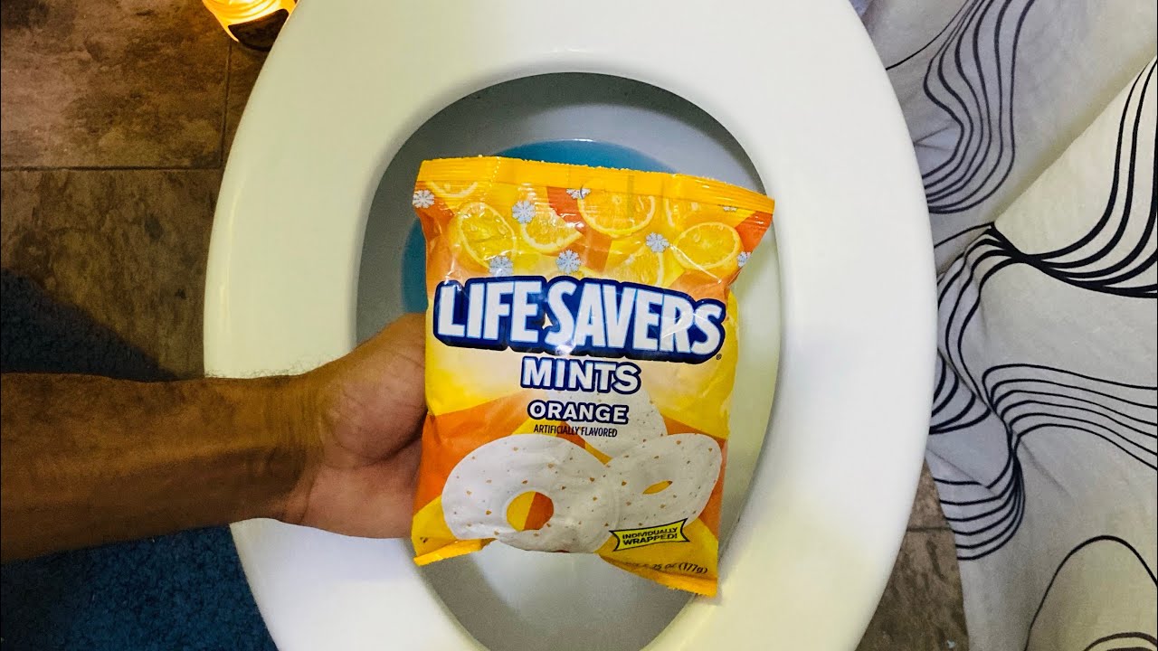Will it Flush? - LifeSavers Mints Orange 🍊 #asmr #satisfying #shorts #candy #orange #lifesaver #lit