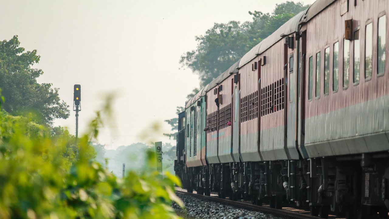 Dual Cab EMD from SGUJ DLS hauling Kamakhya - Dr. Ambedkar Nagar Weekly Exp Special approaching SGUJ