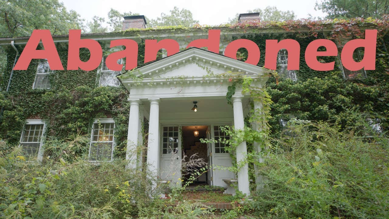 Abandoned colonial style house with everything left behind