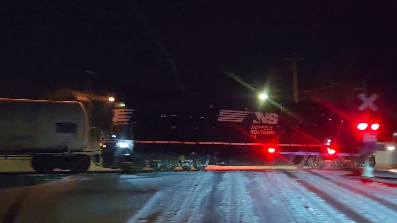 Norfolk Southern train from crossing... after dark?