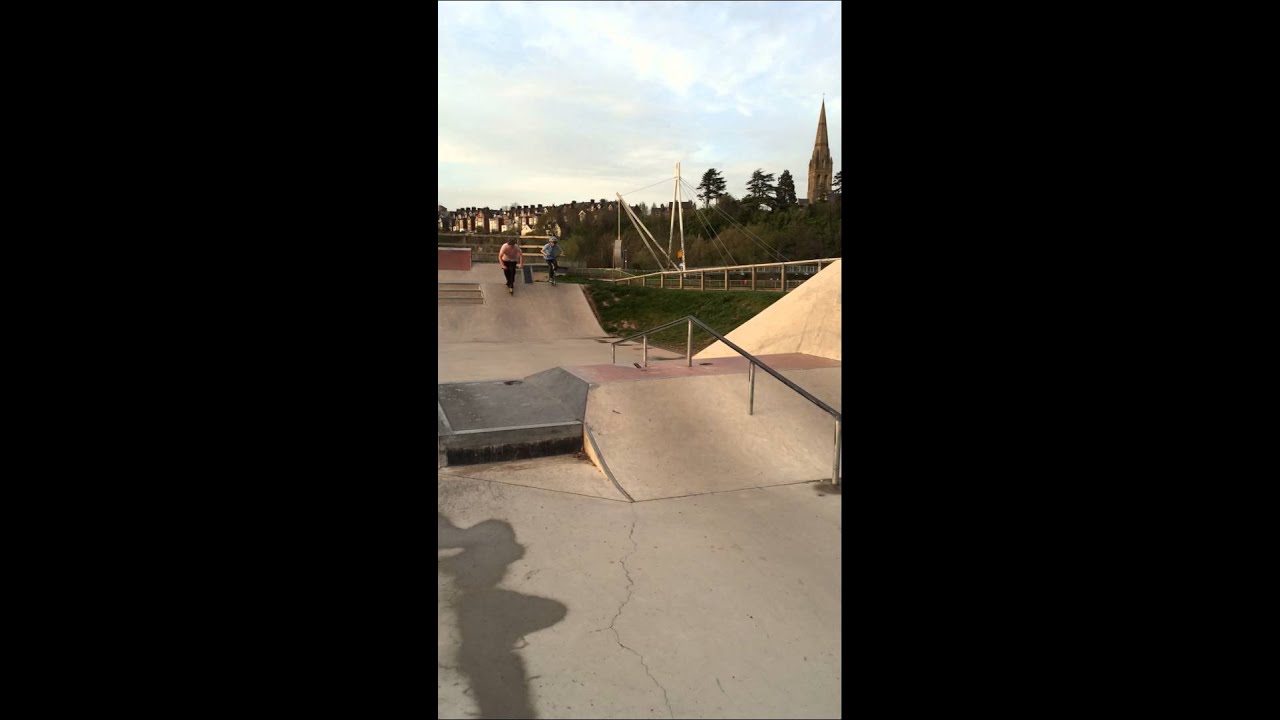 Fat kid and Skinny kid jump the box on stunt scooters