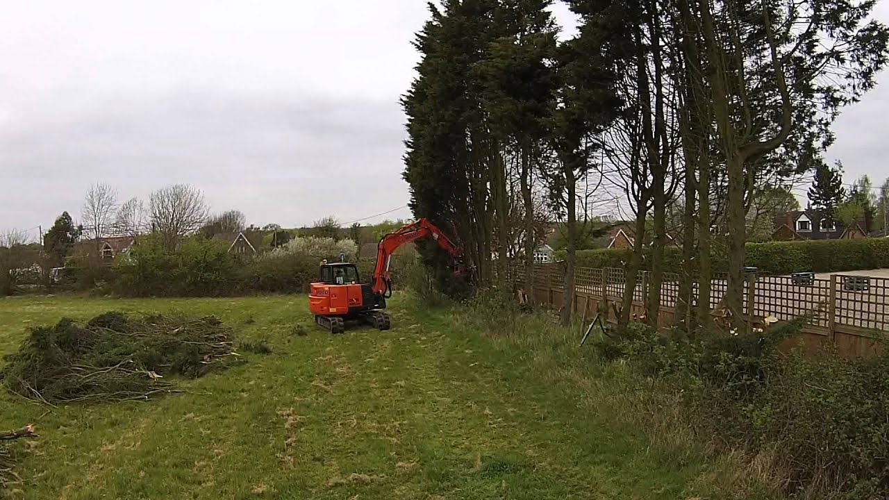 TMK Tree Shear on a 5 and 8 Ton excavator