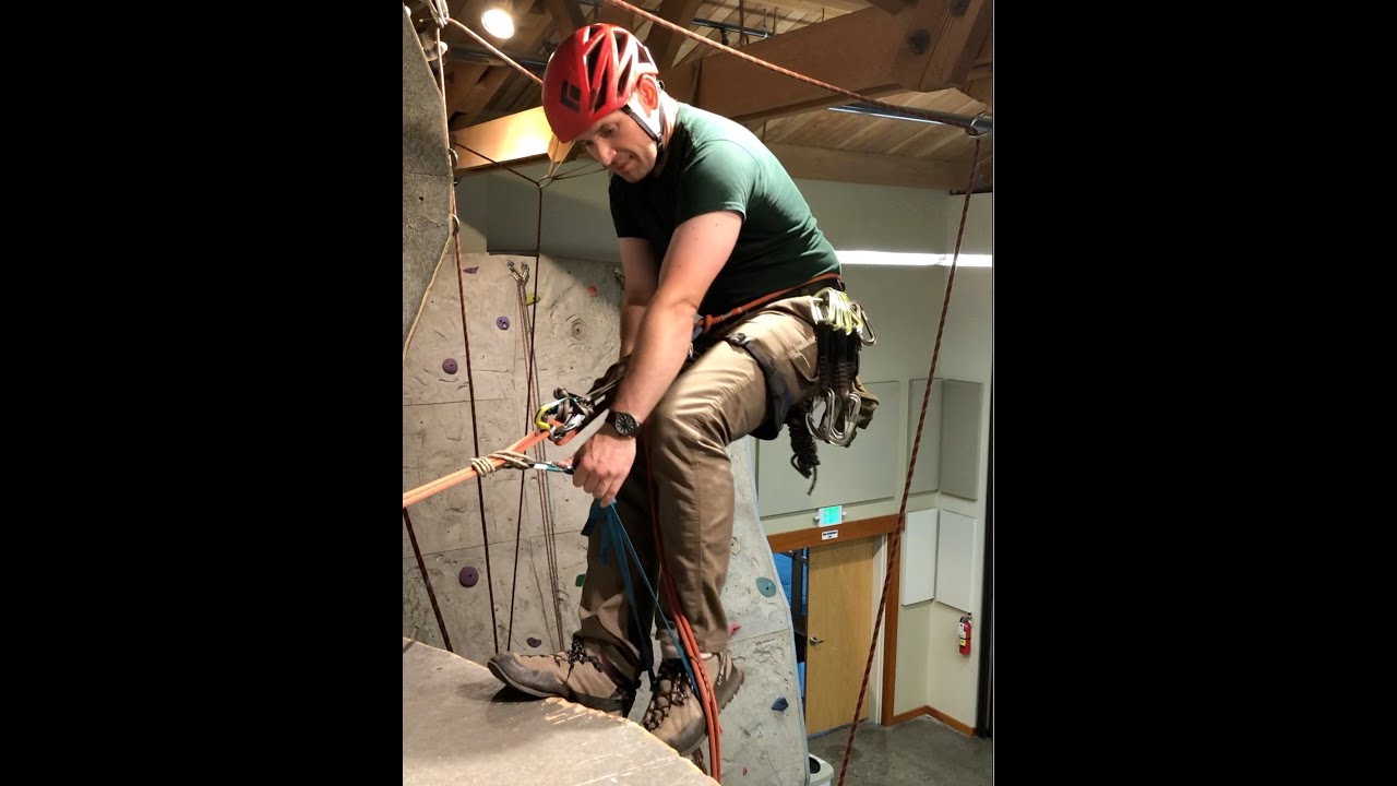A footloop for rappelling over an edge with a low anchor