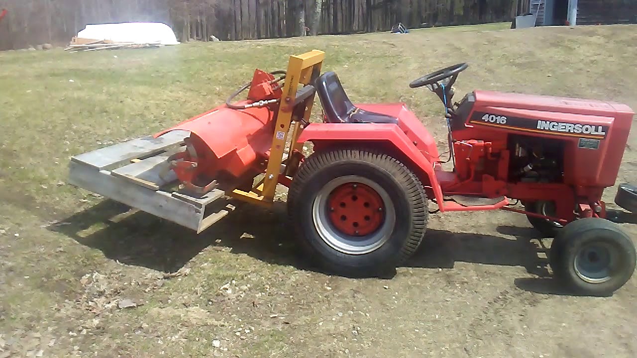 Ingersoll 4016 with Carry All attachment.