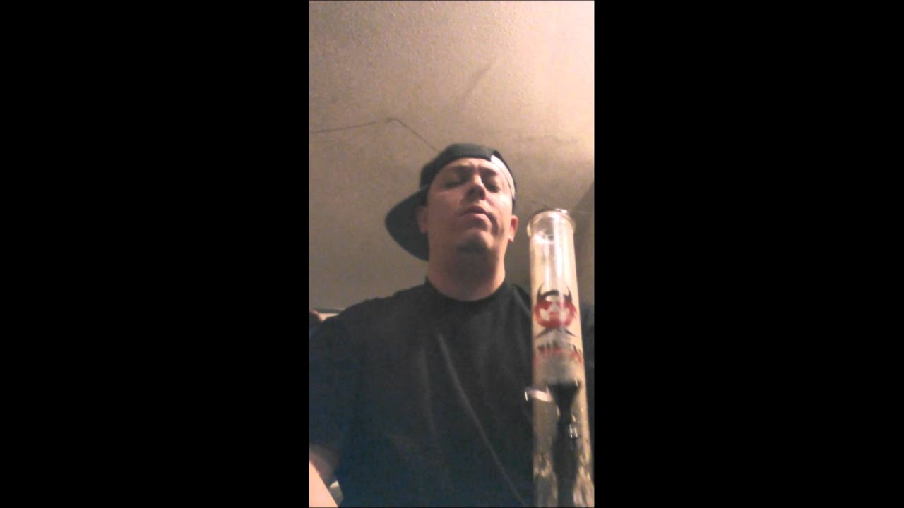 Azo smoking a bowl in the biohazard bong