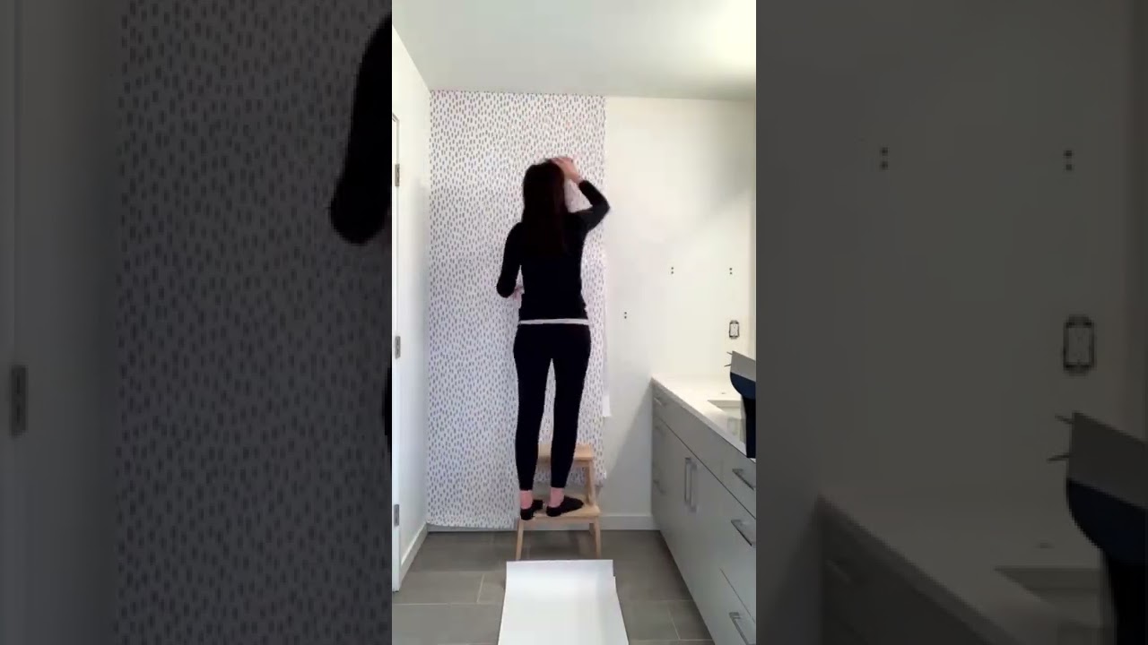 Neutral bathroom remodel featuring Grey Speckle Wallpaper Design. 