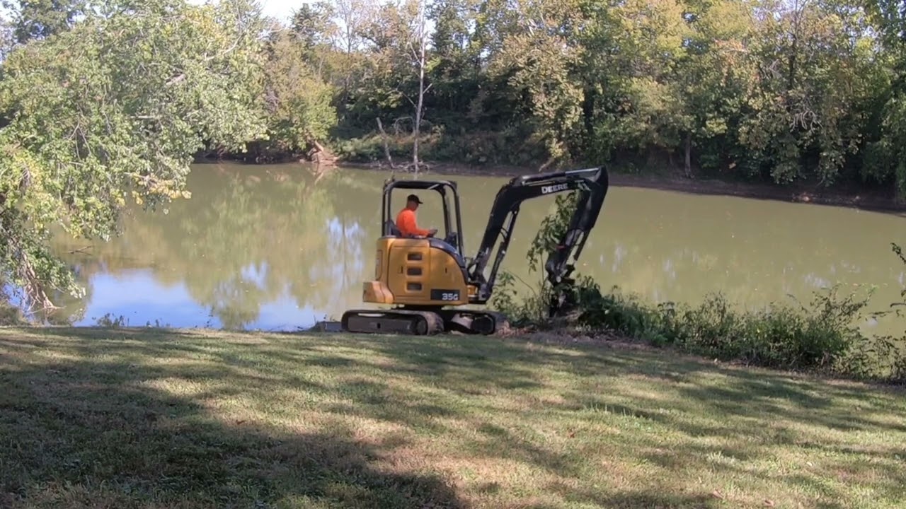 Rut MFG Brush Eliminator on JD35G Riverbank Cleanup