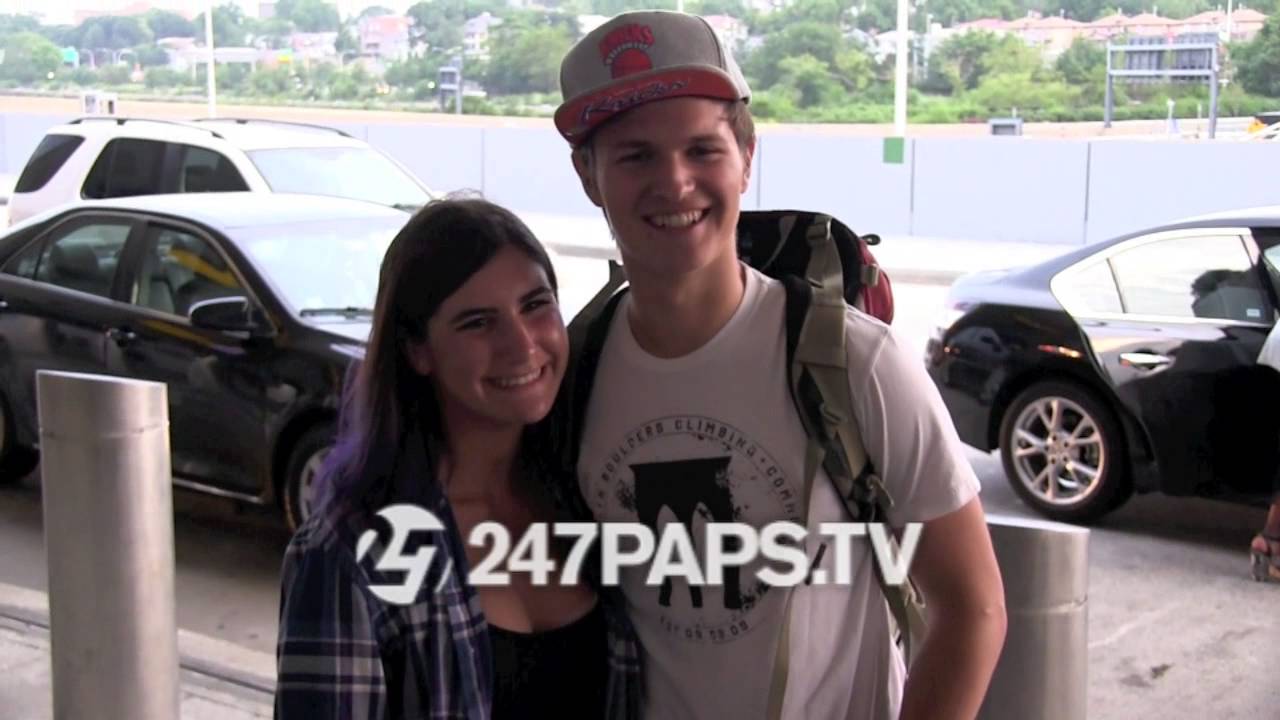(Exclusive) Ansel Elgort Takes pictures with Fans at NYC Airport 07-13-14