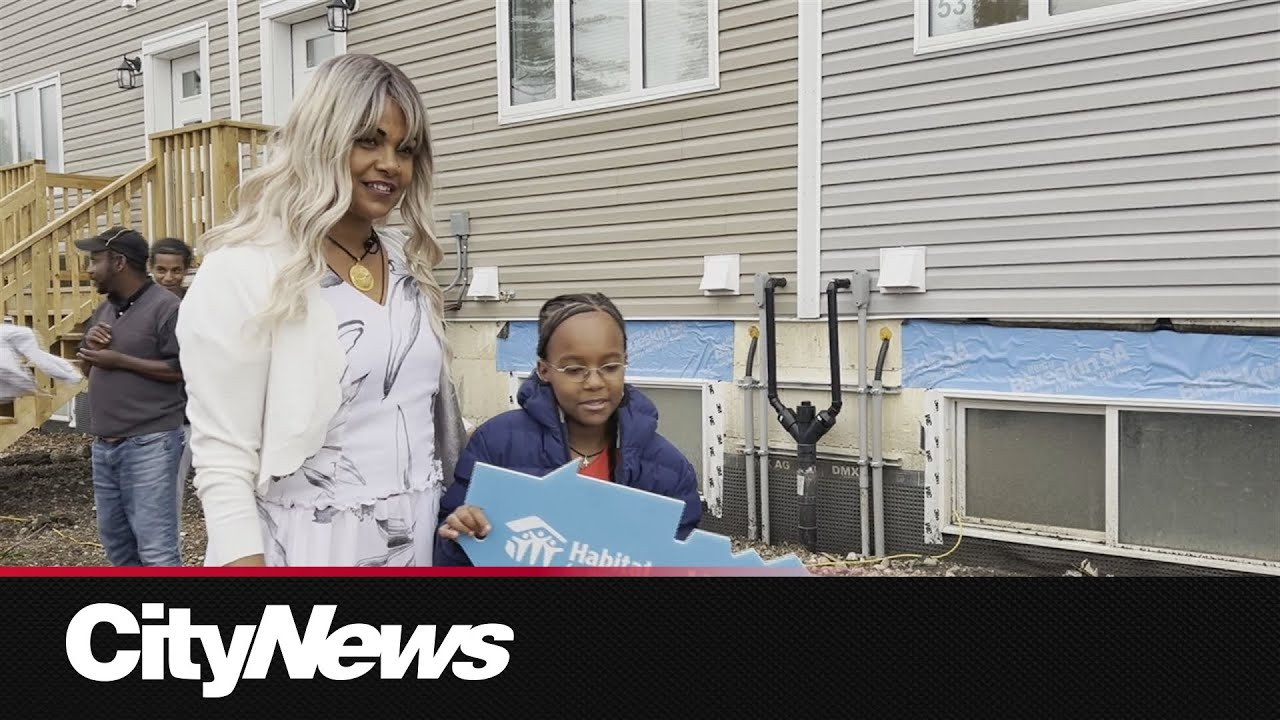 The lives of 15 families is forever changed, as Habitat for Humanity hands over the keys to their ne
