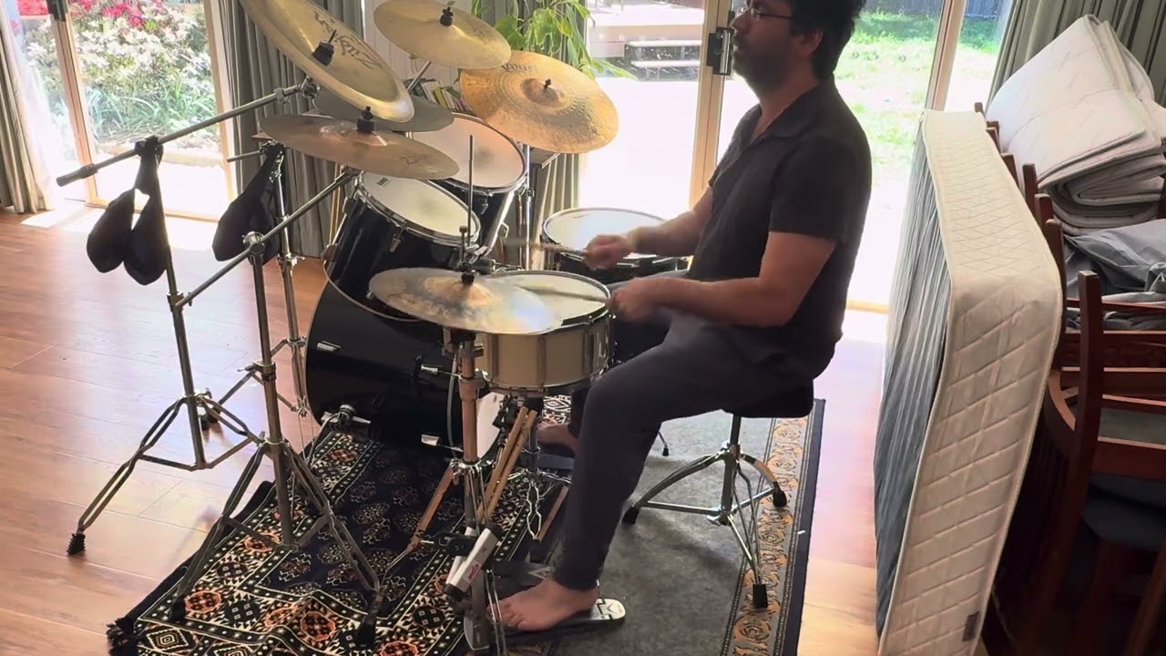 #8 -- Drummer slips into iron pocketed groove—hits the wrinkles