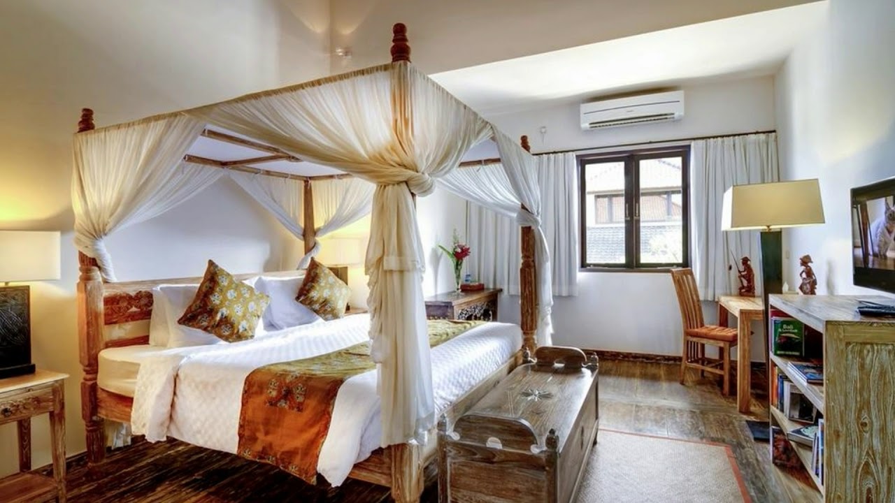 Hevea Villas boasts a private outdoor swimming pool surrounded by tropical greenery