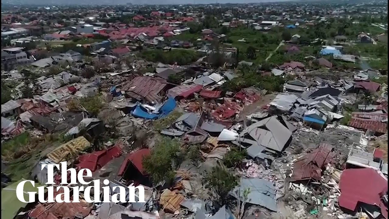 Indonesia tsunami: drone footage shows trail of destruction in Palu