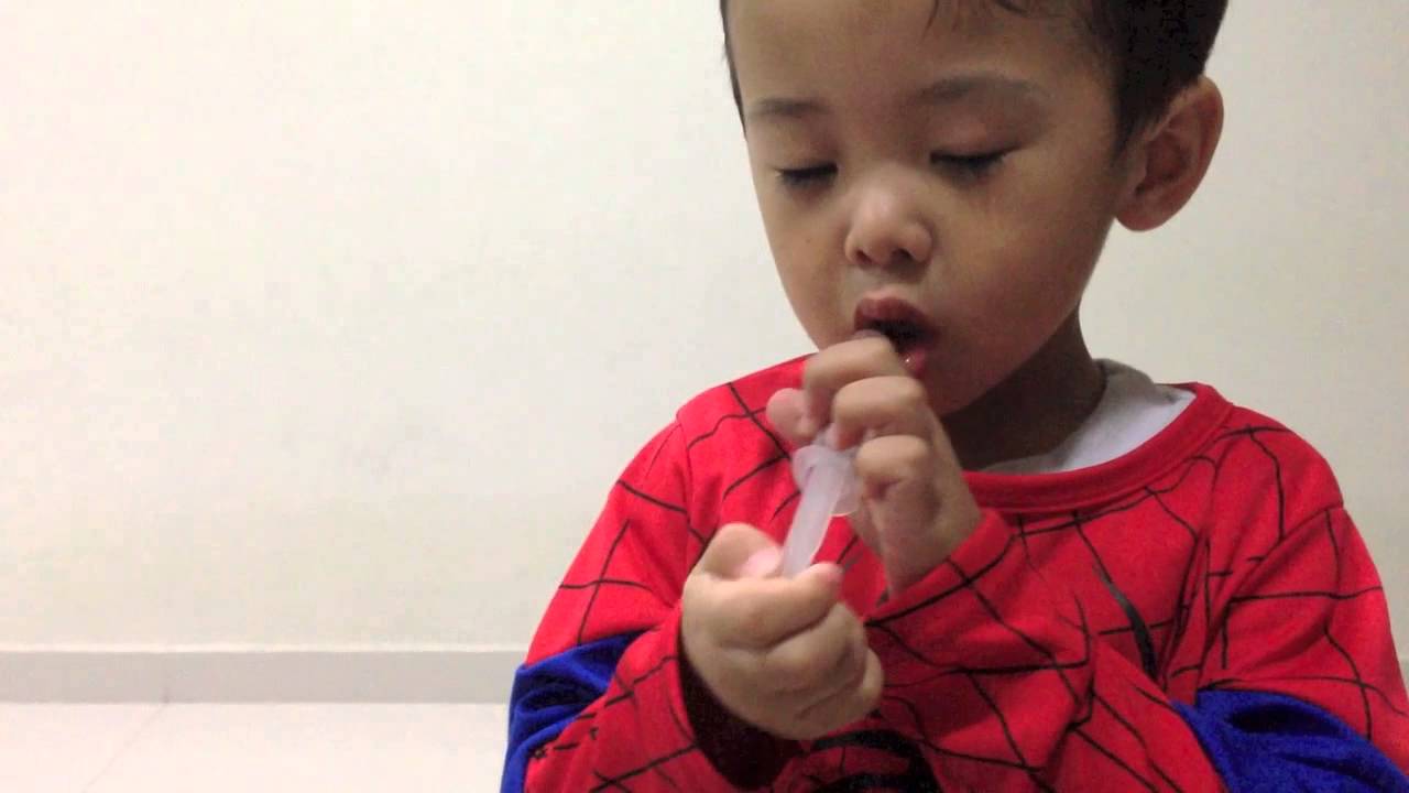 My 3 years old boy taking medicine himself