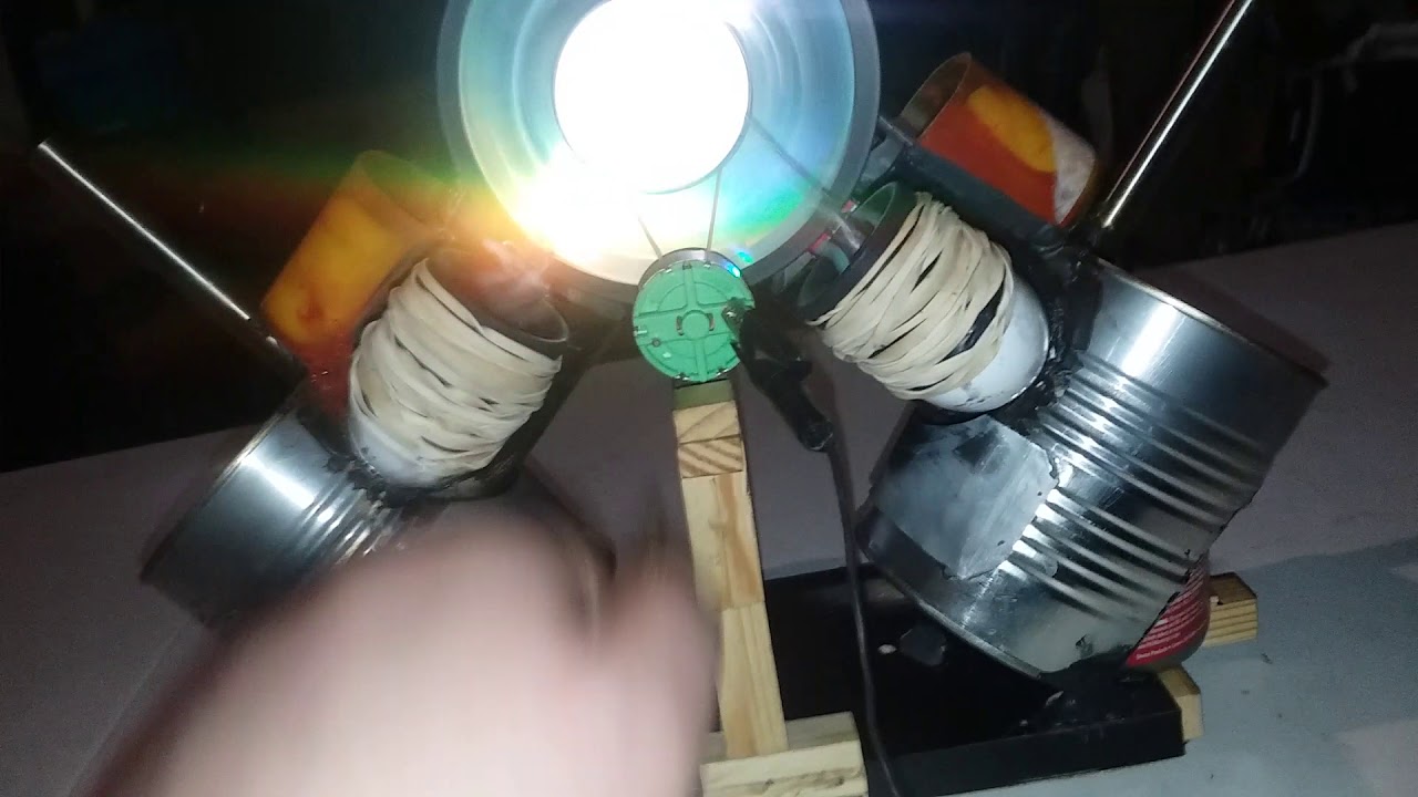 Homemade v2 gamma stirling engine from beer cans. Powers small LED light
