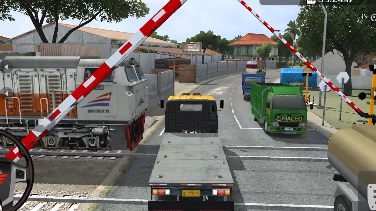“Stuck at the Railway Crossing! Realistic Traffic Moment in Purwokerto – Truck Simulator Indonesia”