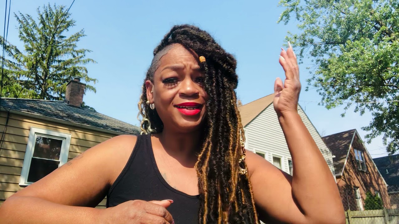 Natural looking locs with shaved sides