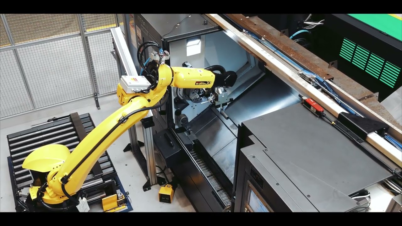 Robotic tube machining cell