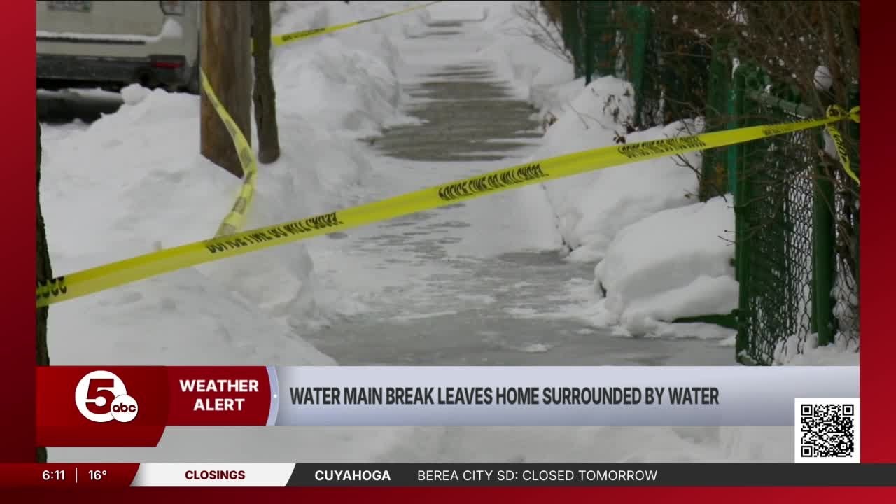 'I'm not safe!' Elderly woman's home surrounded by water & ice creates dangerous situation