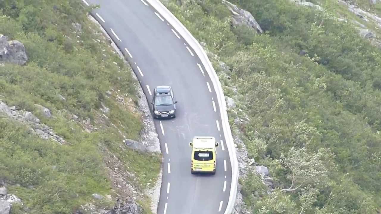 2 Norwegian Ambulances driving up the Trollstigen