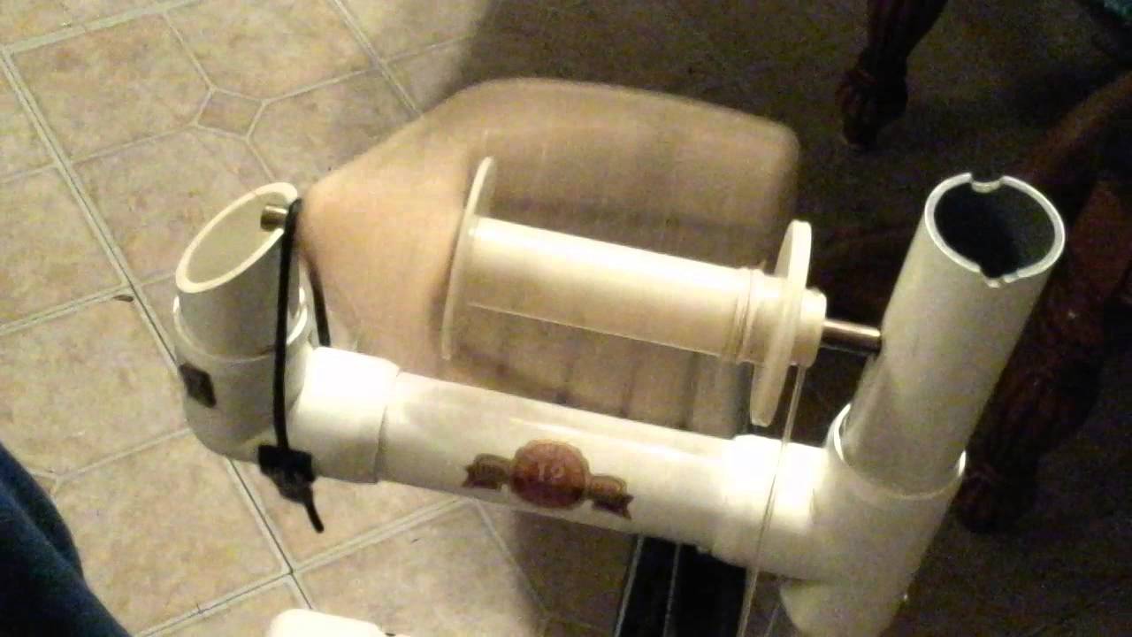 Spinning cotton on a babe fiber production wheel