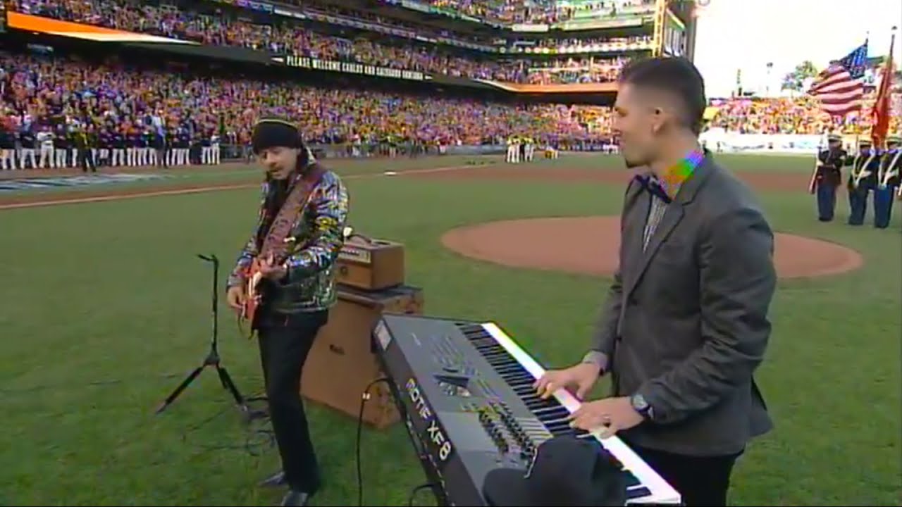 Salvador Santana & Carlos Santana Performing The National Anthem At Game 4 of the 2014 World Series