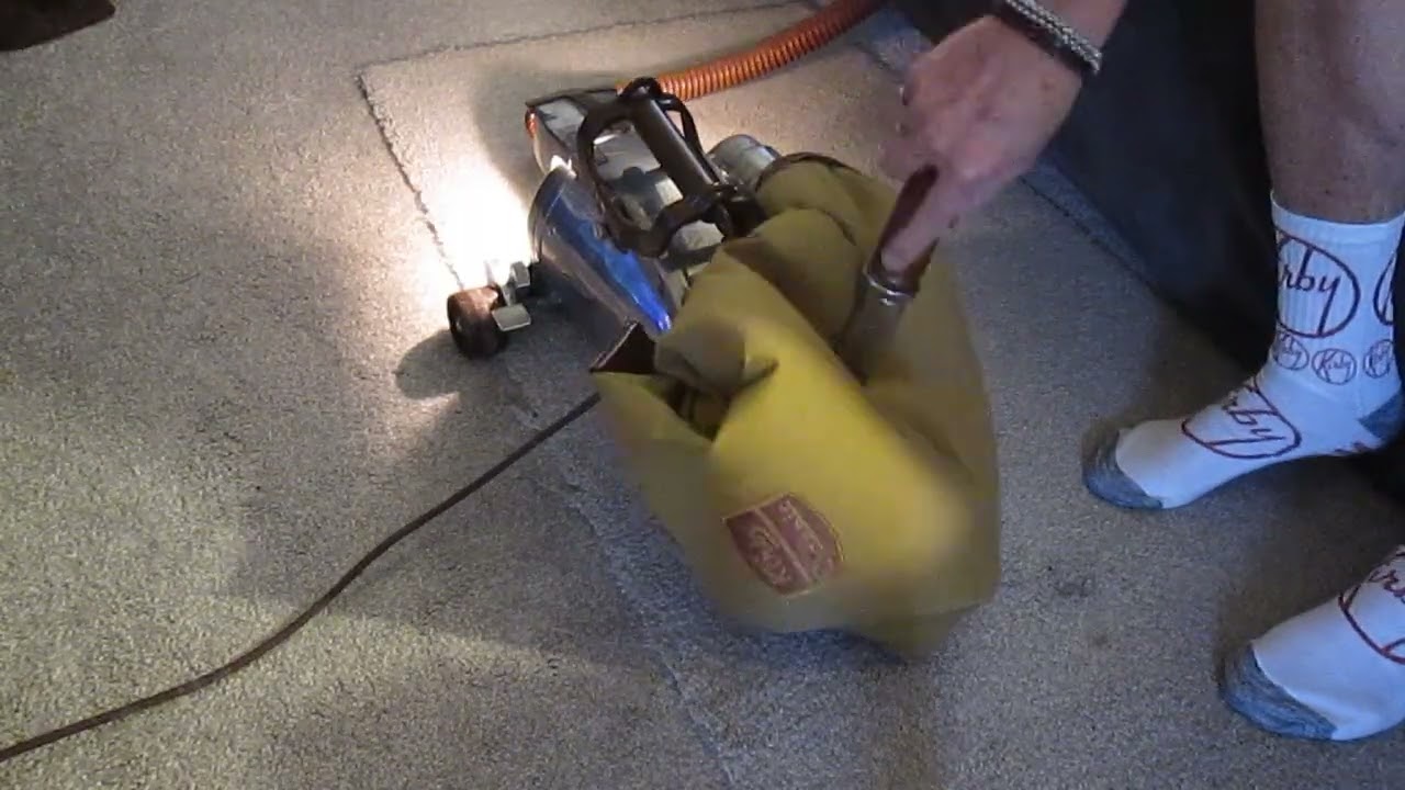 MVI 4683 kirby socks guy using my kirby classic in compact mode vacuuming plastic beads