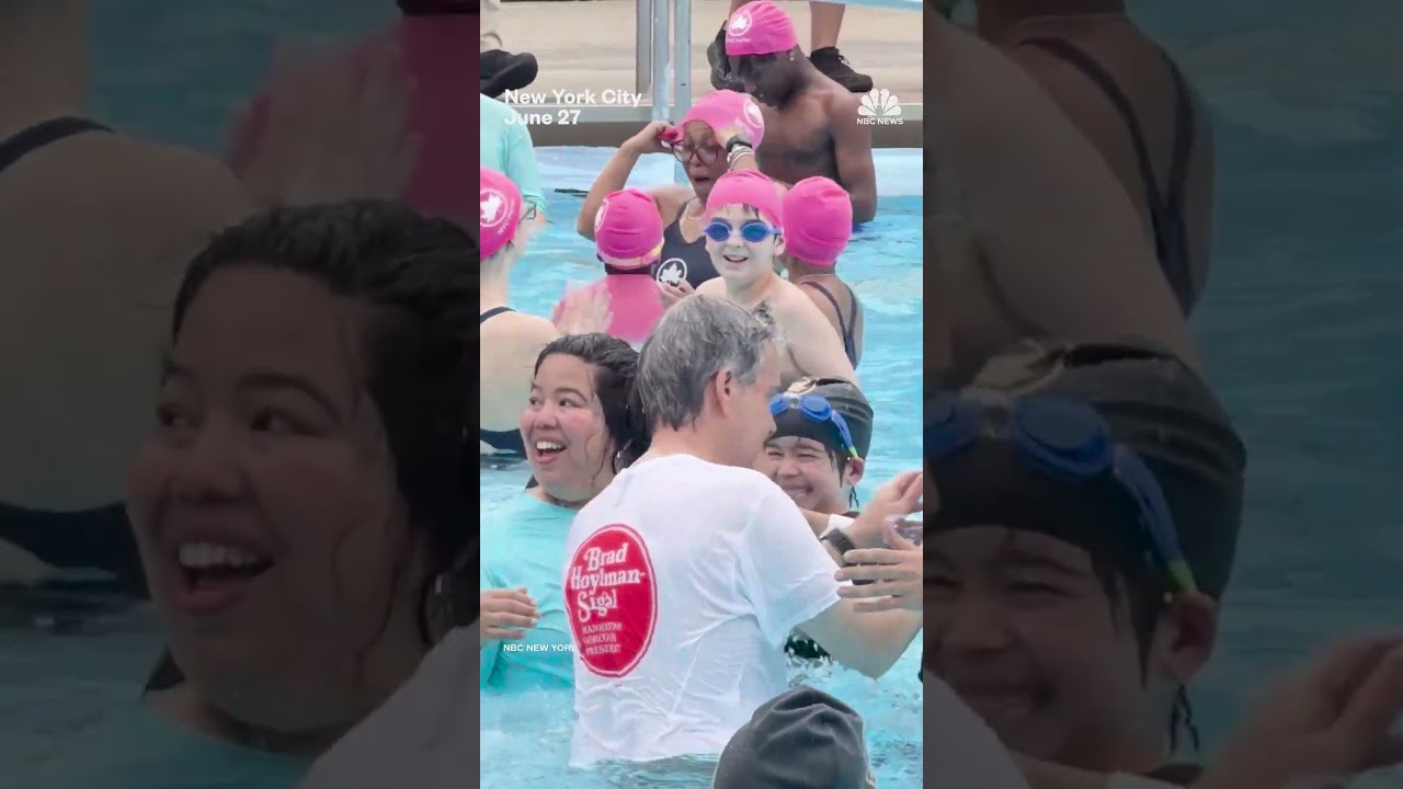 Mamdani jumps into a pool in his suit to mark opening of NYC pools