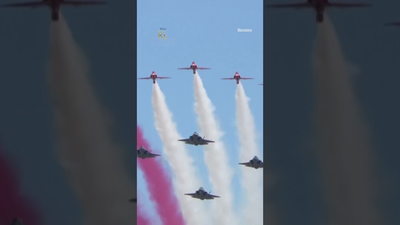 Prince George fights off sneeze during Red Arrows flypast