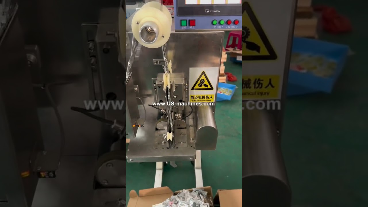 Automatic snack nut food sachet pouch link bag cutting dispensing feeding machine