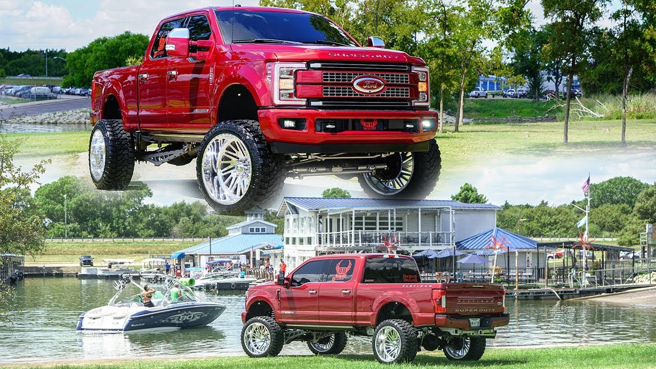 BEAUTIFUL RUBY RED F250 PLATINUM Lifted on 26x14s cruises Dallas Forth Worth lakes!