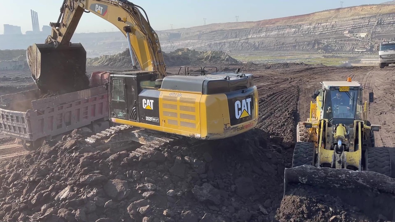 Caterpillar 352F Excavator Loading Overburden On 4 Axle Trucks - Ascon Ltd