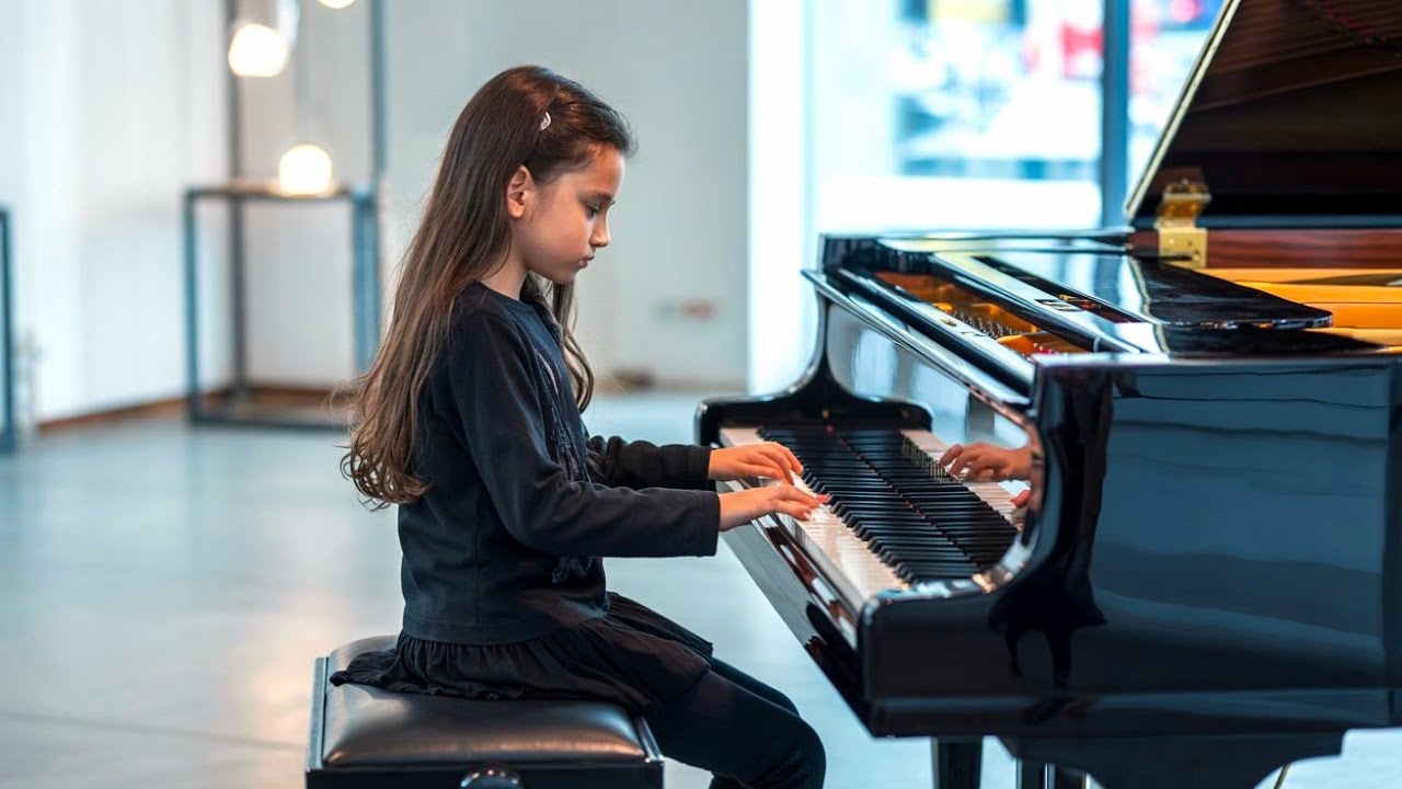 Girl Sits at Store Piano and Starts Playing Turkish March — Shoppers Gasp in Amazement....