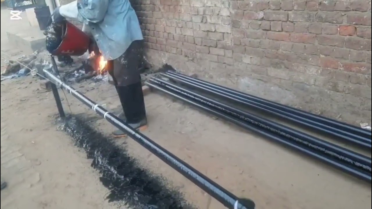 steel pipe insulation process with bitumen compound & fiber glass cloth