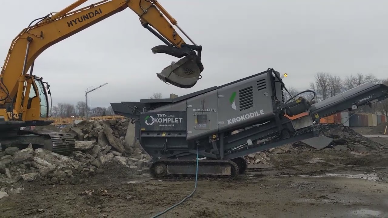 Kelowna's TNT Crushing it with our 2020 Komplete Krokodile crushing concrete with rebar 3 inch -