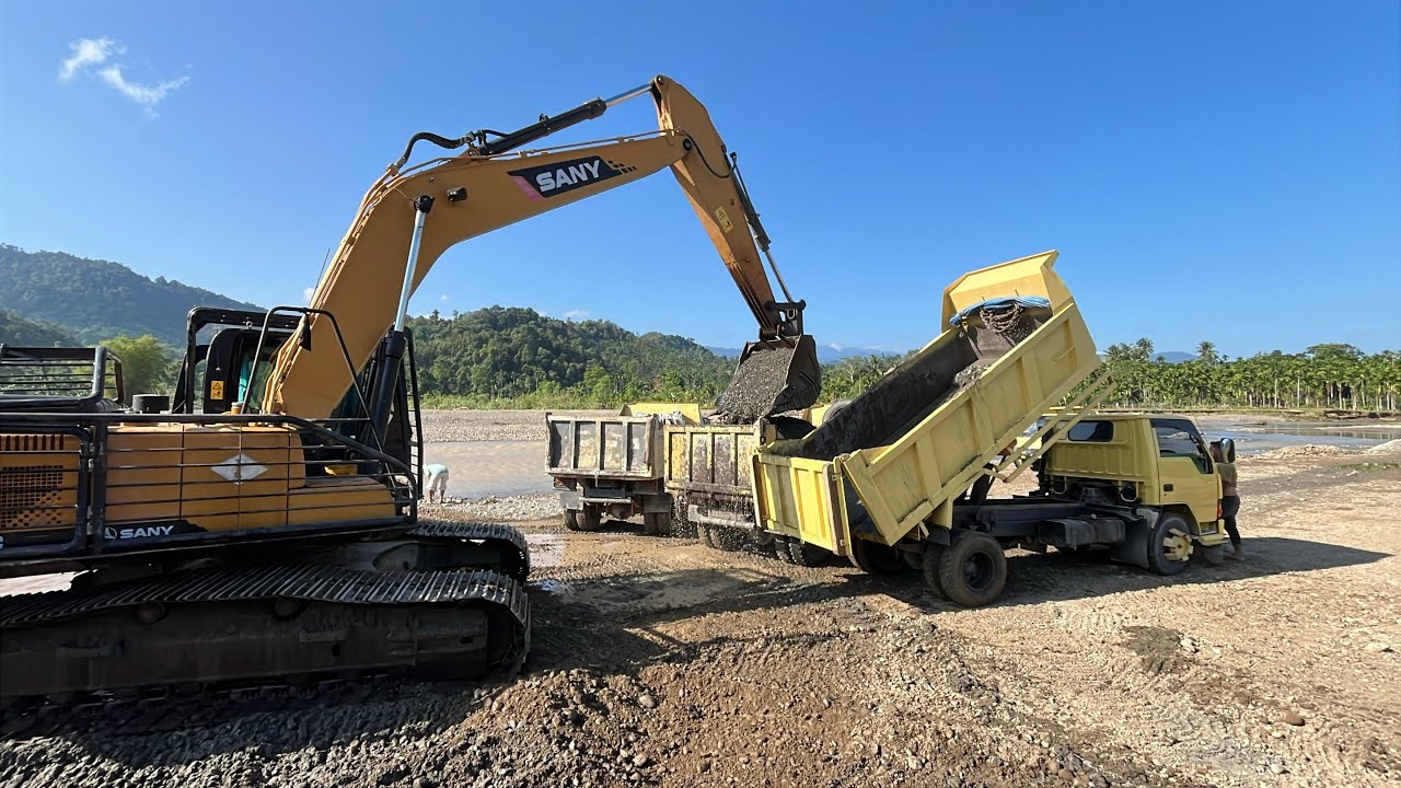 Excavator Works Loading Sand to Dump Truck in the River | Heavy Equipment Loading Sand