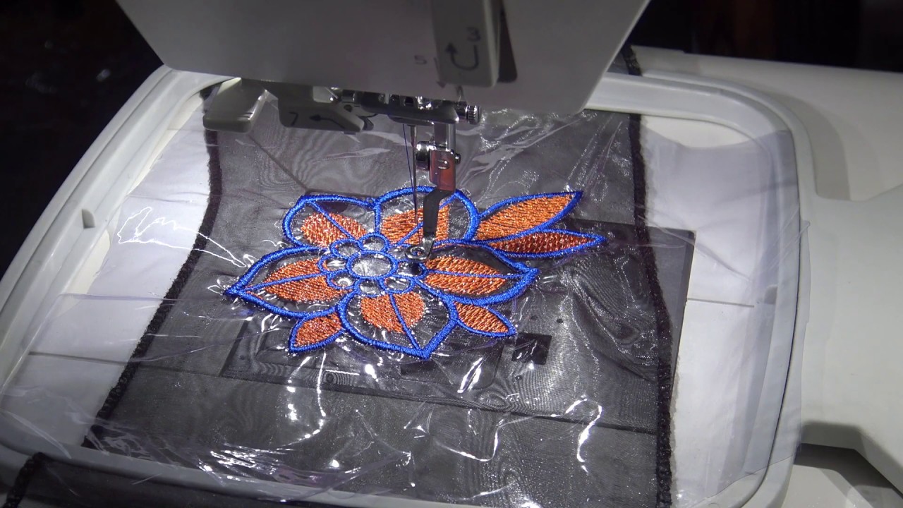 Janome memory craft 550e embroidery machine - difficult organza fabric