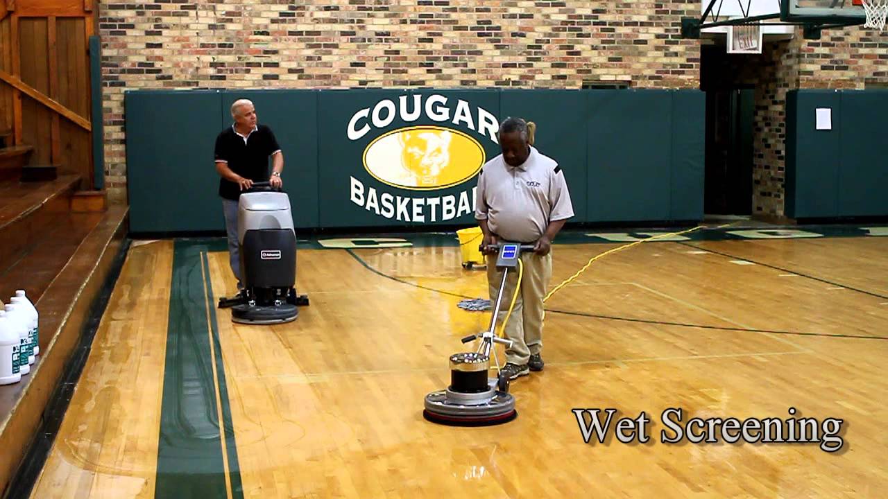 Fuqua Property Maintenance - How we screen and recoat a wood gym floor