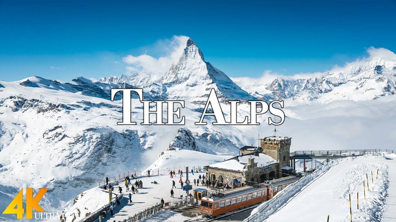 Winter The Alps 4K Ultra HD • Drone View Snowy Alps, Scenic Relaxation Film with Calming Music.