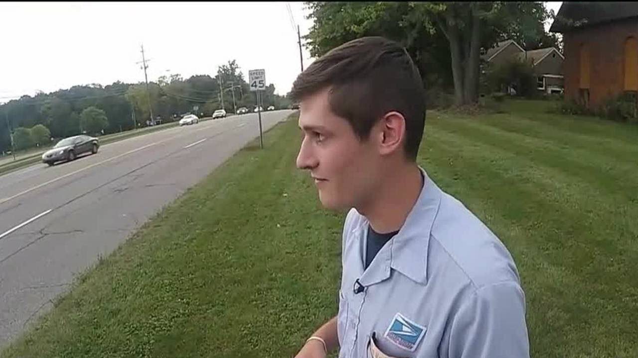 Mailman stops runaway car