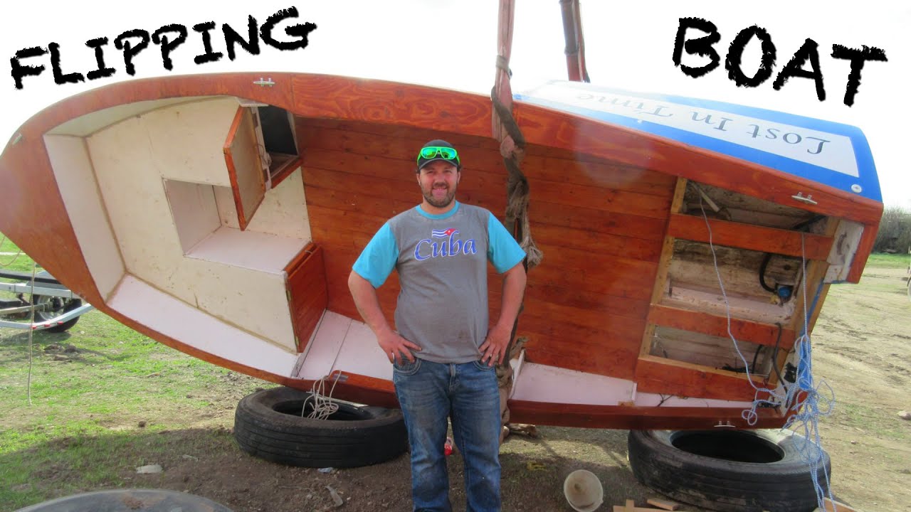 Flipping Antique Wood Boat