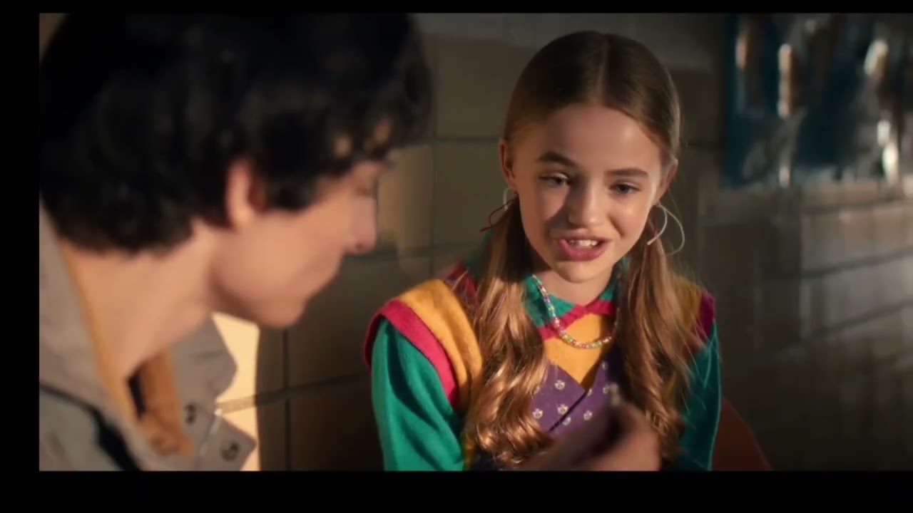 Mike Wheeler helps his sister Holly 