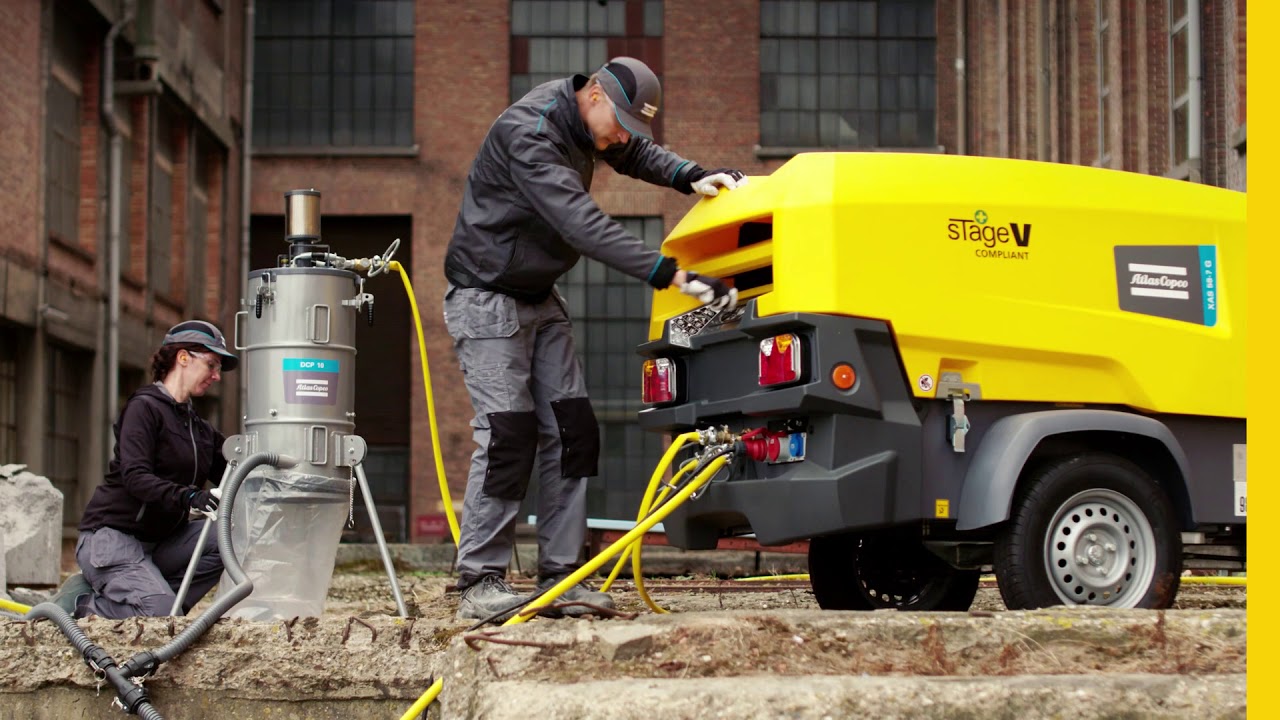 One small diesel compressor powers two pneumatic tools, a dust collector and a light tower