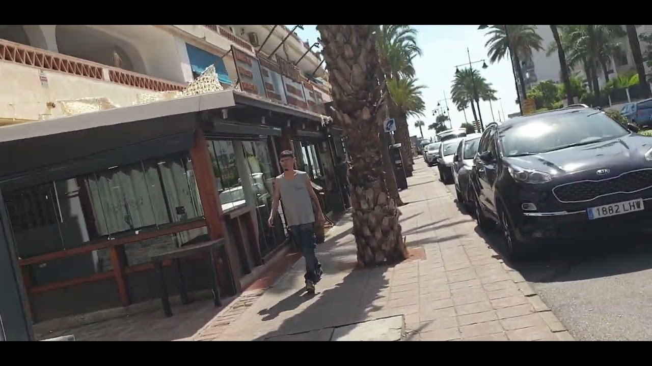 Benalmadena Av De Las Palmeras Strip shops bars restaurants Pueblo Arroyo de la Miel