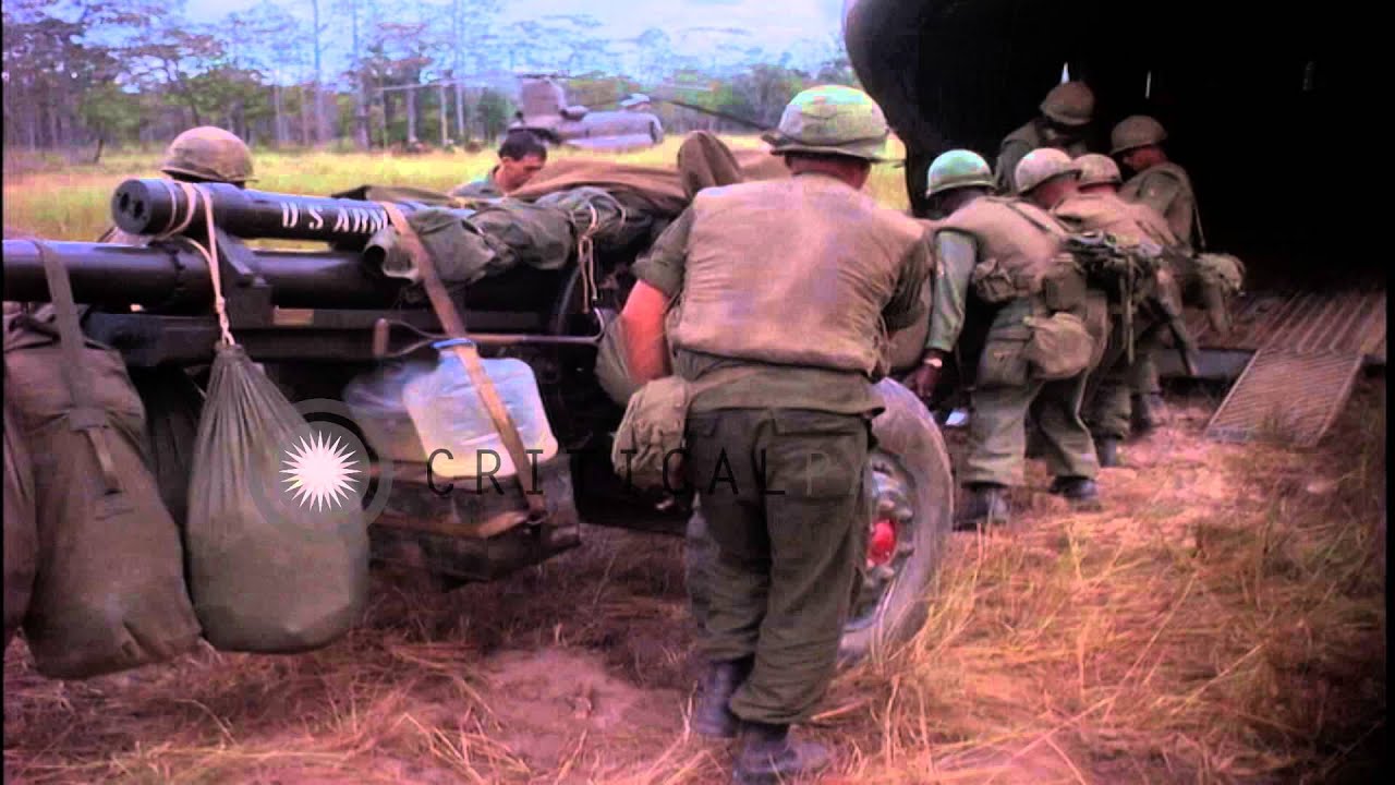 Soldiers of the 2d Battalion, 8th Cavalry,1st Brigade load a 105mm Howitzer into ...HD Stock Footage
