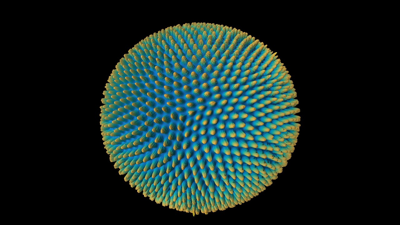 Pulsating spots in the Gray-Scott model on the sphere